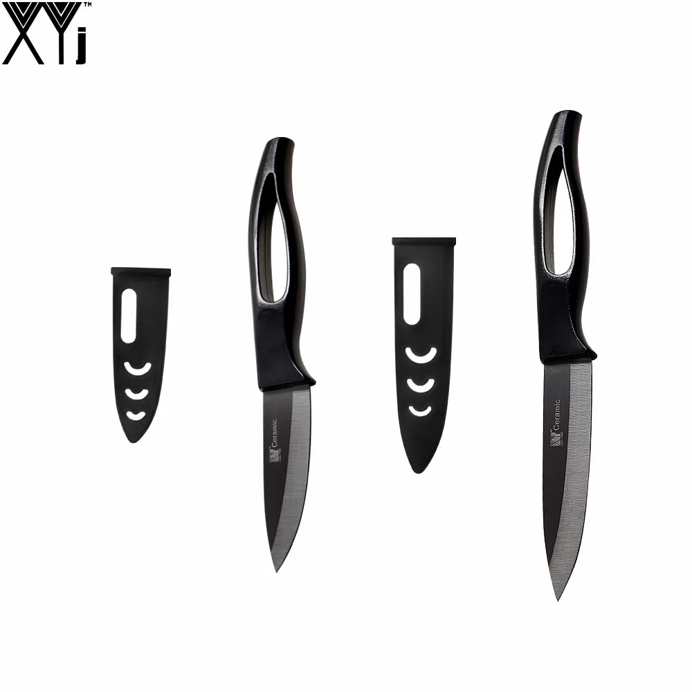 ABS + TPR Hollow Handle Kitchen Knives XYJ Brand Black Blade Ceramic