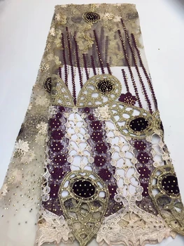 

Latest French Nigerian lace fabric with wax high quality African gold lace fabric with stone for wedding ZX32551