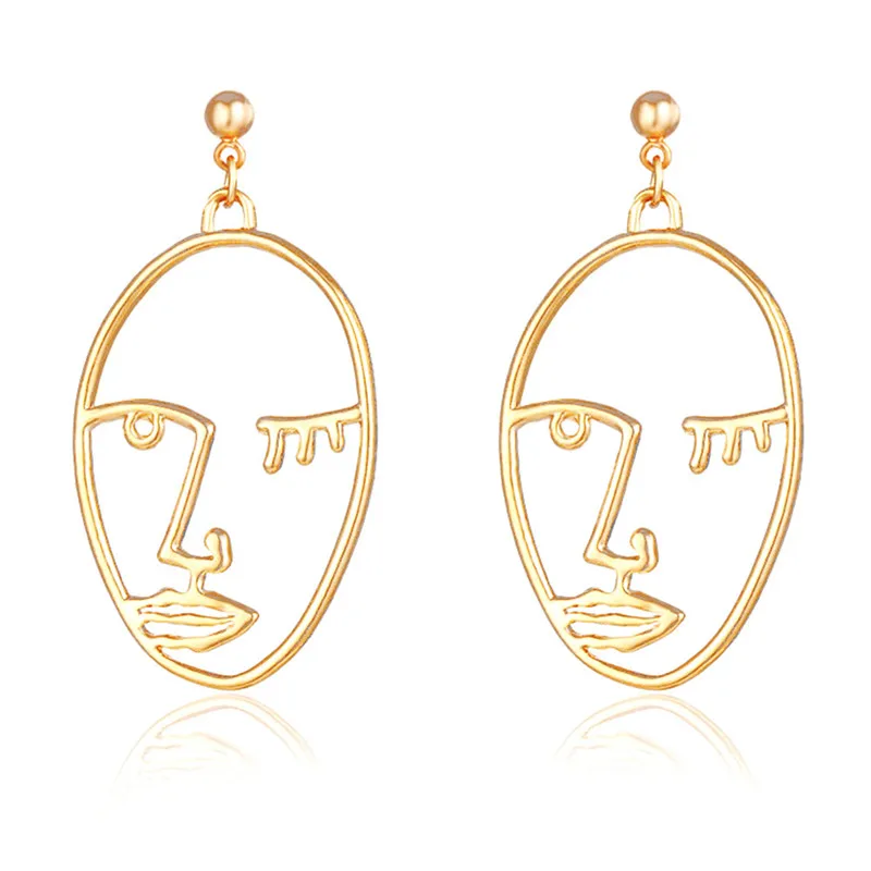 

Unique Personality Exaggerated Metal Hollow Out In The Face Of The Human Body Earrings Profile Women Abstract