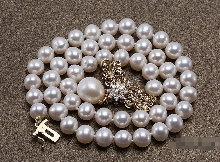 

8-9 Selected Round White Edison Pearl Necklace with a Sterling Silver Piece