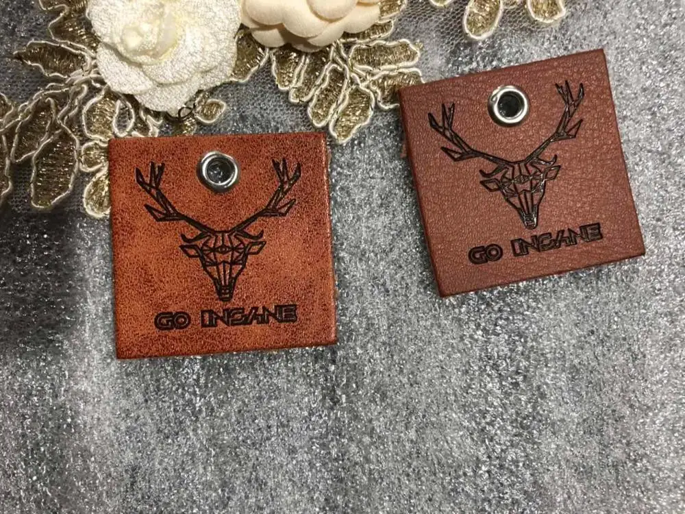 Customized leather label, PU leather label, PU patch, debossed / embossed logo leather tags with copper silver eyelet