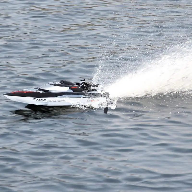 

FT012 Remote Control Submarine Speedboat 2.4G 4CH Remote Controlled Brushless Racing RC Boat 45 km/h Black 46x12.5x11.8CM