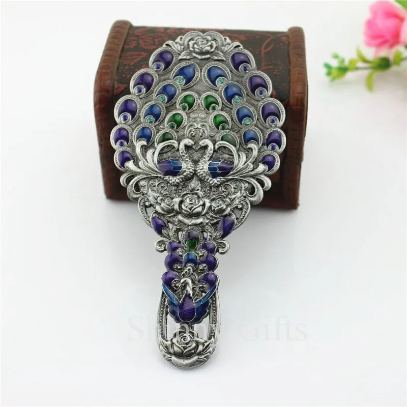 Peacock mirror with hand (1)