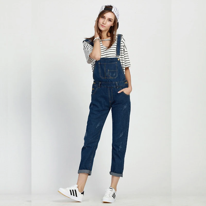 Items in search results Stay up to the minute in trending fashions with this awesome one piece stretch denim jumpsuit in dark blue. It is a sleeveless garment that is perfect for spring and summer wear.