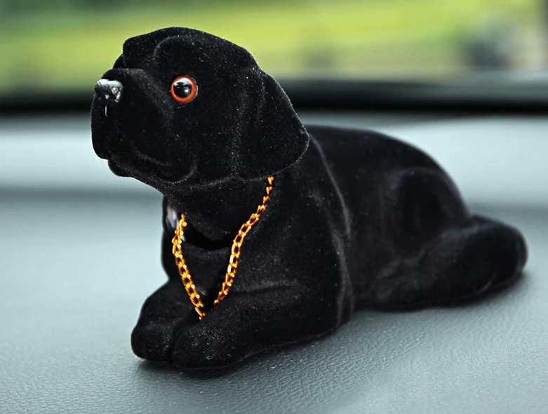 muñeco de perro que mueve la cabeza