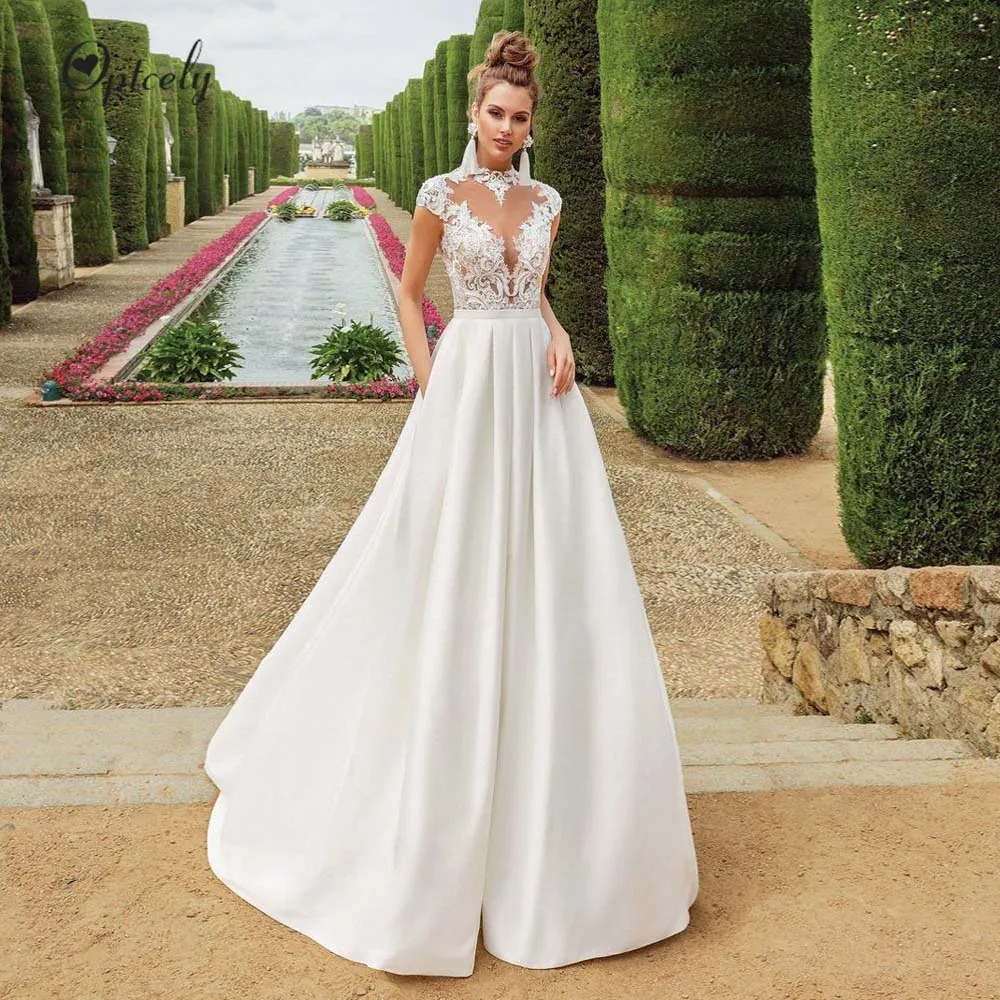

Optcely Elegant O-Neck Bow A-Line Wedding Dresses 2019 Vintage Appliques Cap Sleeve Customized Sweep Train Bridal Gowns Hot Sale