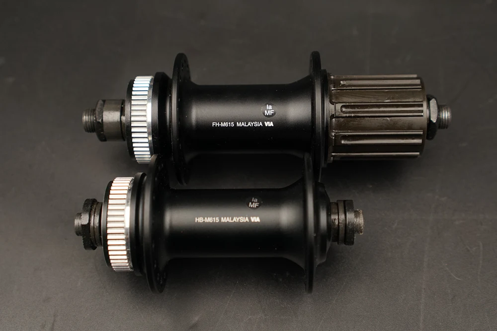 Передняя и задняя ступицы Shimano Deore HB M615 центральный замок передний QR 9x100 мм/задний