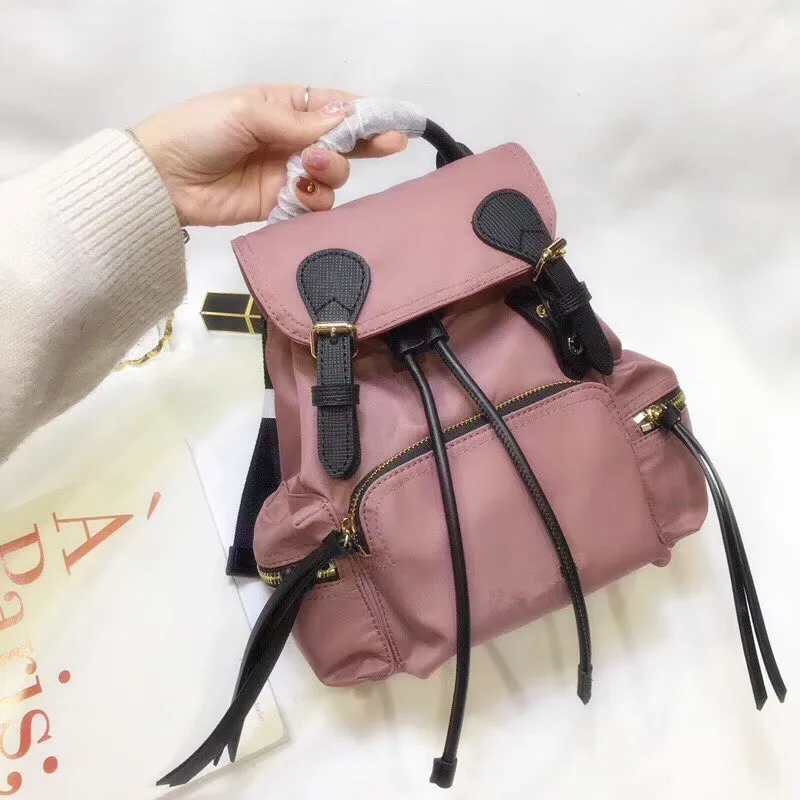 

2018 most fashionable style High-grade canvas Backpack women Multi-purpose bag famous brand cowhide Backpack Free shipping