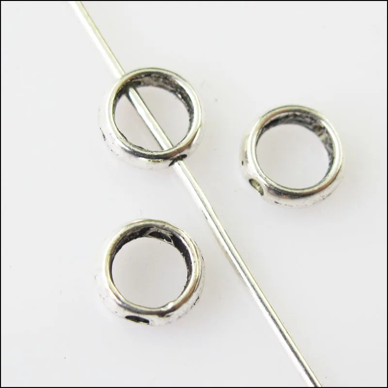 100 Nouveau Tiny Round Frame Charms Tibetan Silver Tone Spacer Beads 6 mm