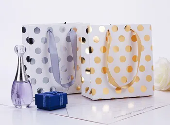 

100pcs Bronzing small round point high-grade cosmetics, clothing, paper handbag