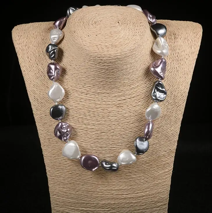

European and American fashion natural special-shaped pearl necklace female teeth stone pearl knotted Necklace