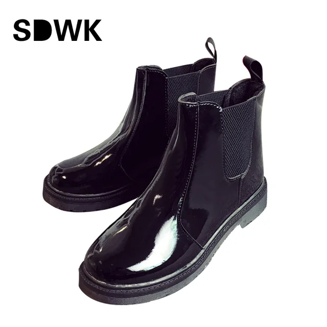 leather boots in rain