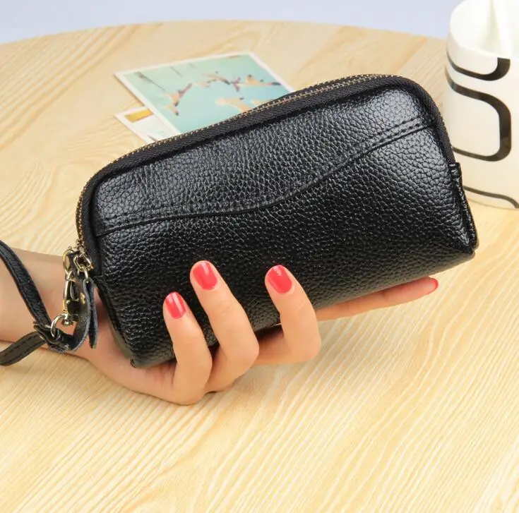 Baratos La nueva bolsa de cuero de la moda europea y americana bolsa de teléfono móvil con doble cremallera para mujer bolso de mano cero bolso
