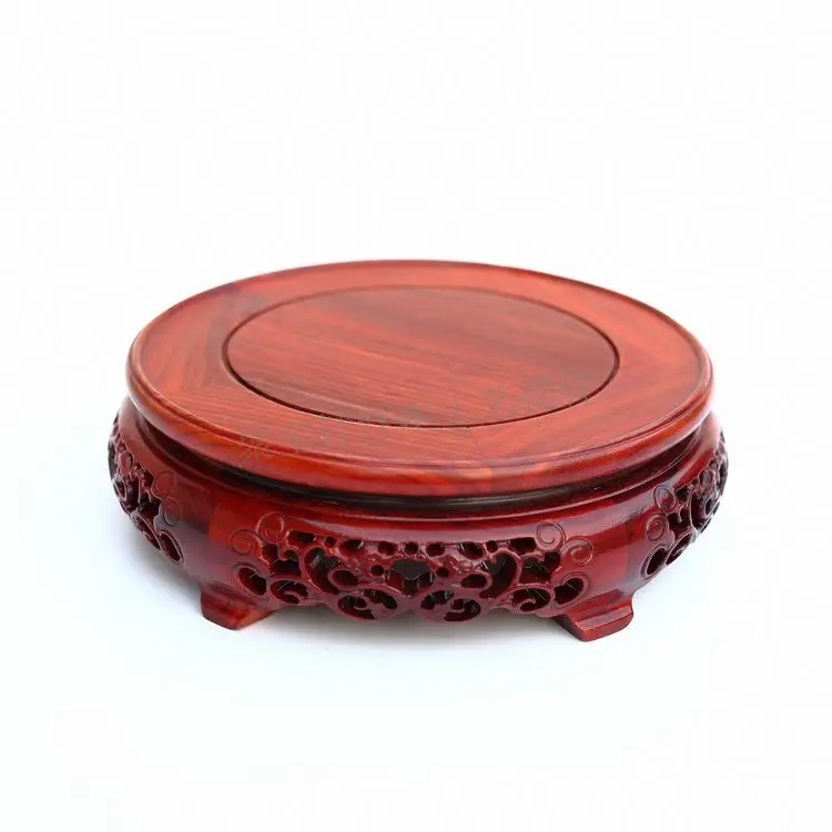 

Red wingceltis of solid wood carving round base household act the role ofing is tasted annatto handicraft furnishing articles