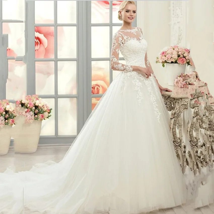 white long sleeve ball gown