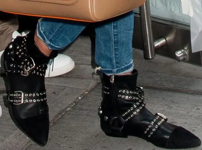 black boots with silver buckles