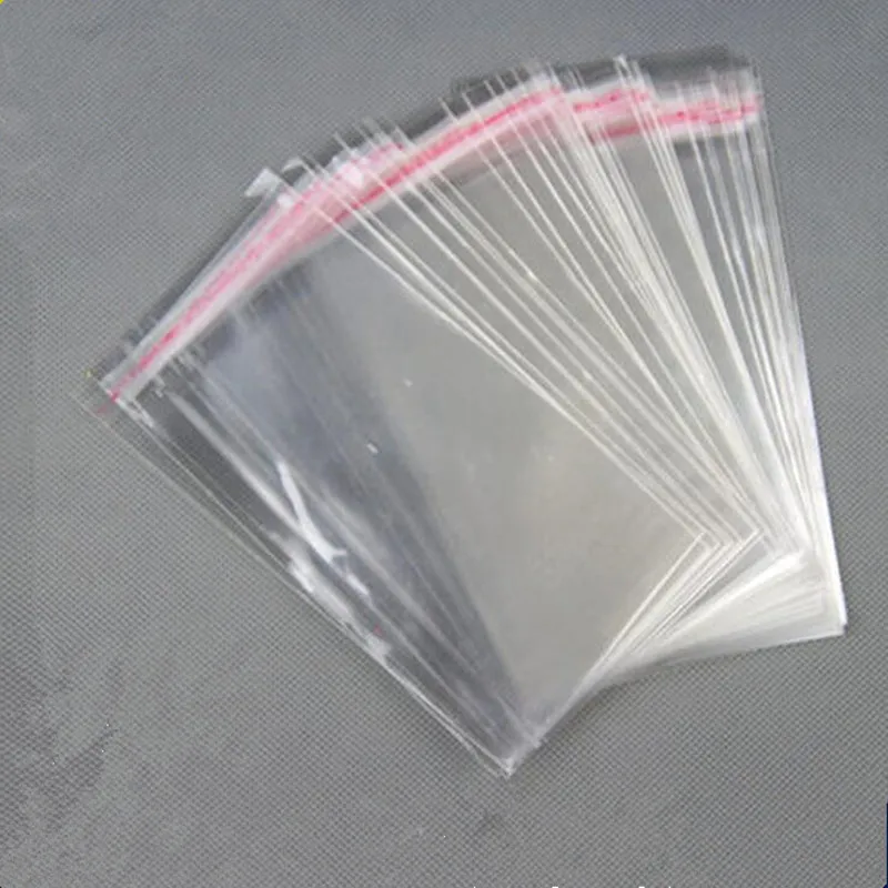 

100pcs 18 size to choose Clear Resealable Cellophane/BOPP/Poly Bags Transparent Opp for plastic storage bag Self Adhesive Seal