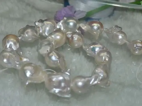 Natural Rare white AA++14X22mm very luster baroque nuclear pearl