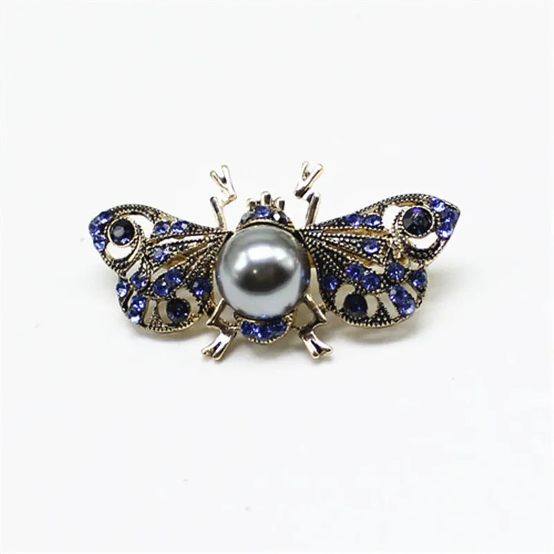 

2019 Europe and the United States retro night insects elegant personality inlaid gray imitation pearl brooch accessories