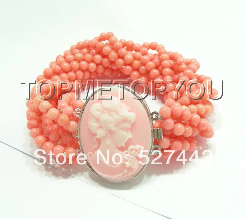 

Wholesale free shipping >>Stunning 10strands round pink coral necklace Cameo clasp