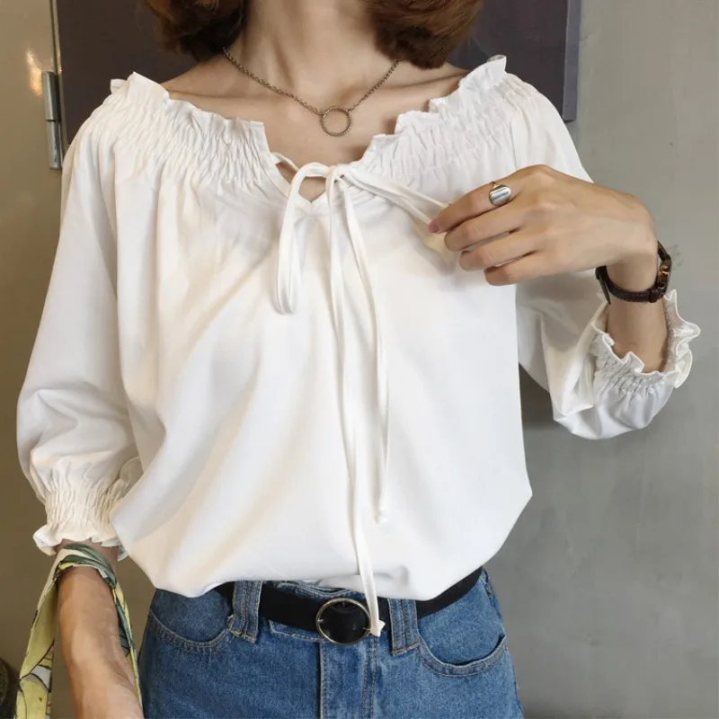 

A collar strap shirt female summer new fashion casual solid color seven-point sleeve shirt female sweet personalized shirt