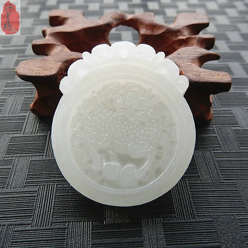 

Chinese natural 100% white stone hand-carved kirin pendant Good luck amulet