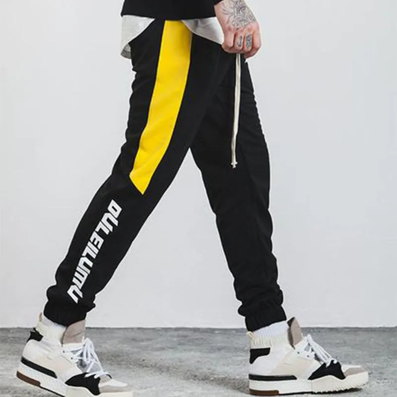 

2018 Men Track Pants Couples Casual Pants Men Skinny Tracksuits Bottoms Men Trousers Sportswear Male Joggers Moletom Size M-XXL