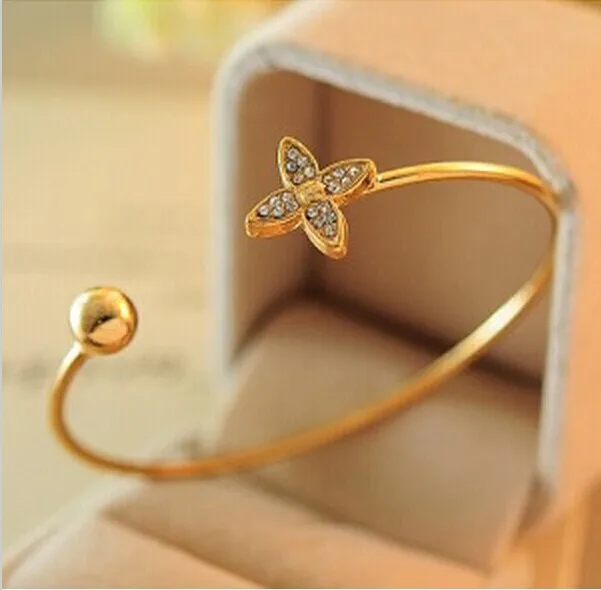 

Women 's Fashion Personality Style Clover Rhinestone Bangles Gold Bracelets 4BD60