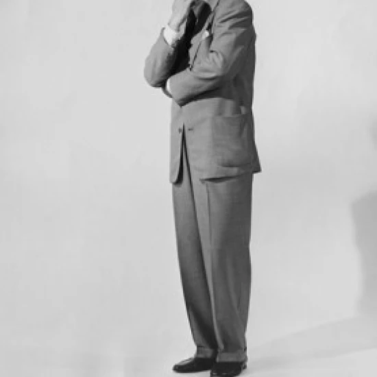 Portrait of businessman thinking with hand on chin Poster Print (18 x 24)