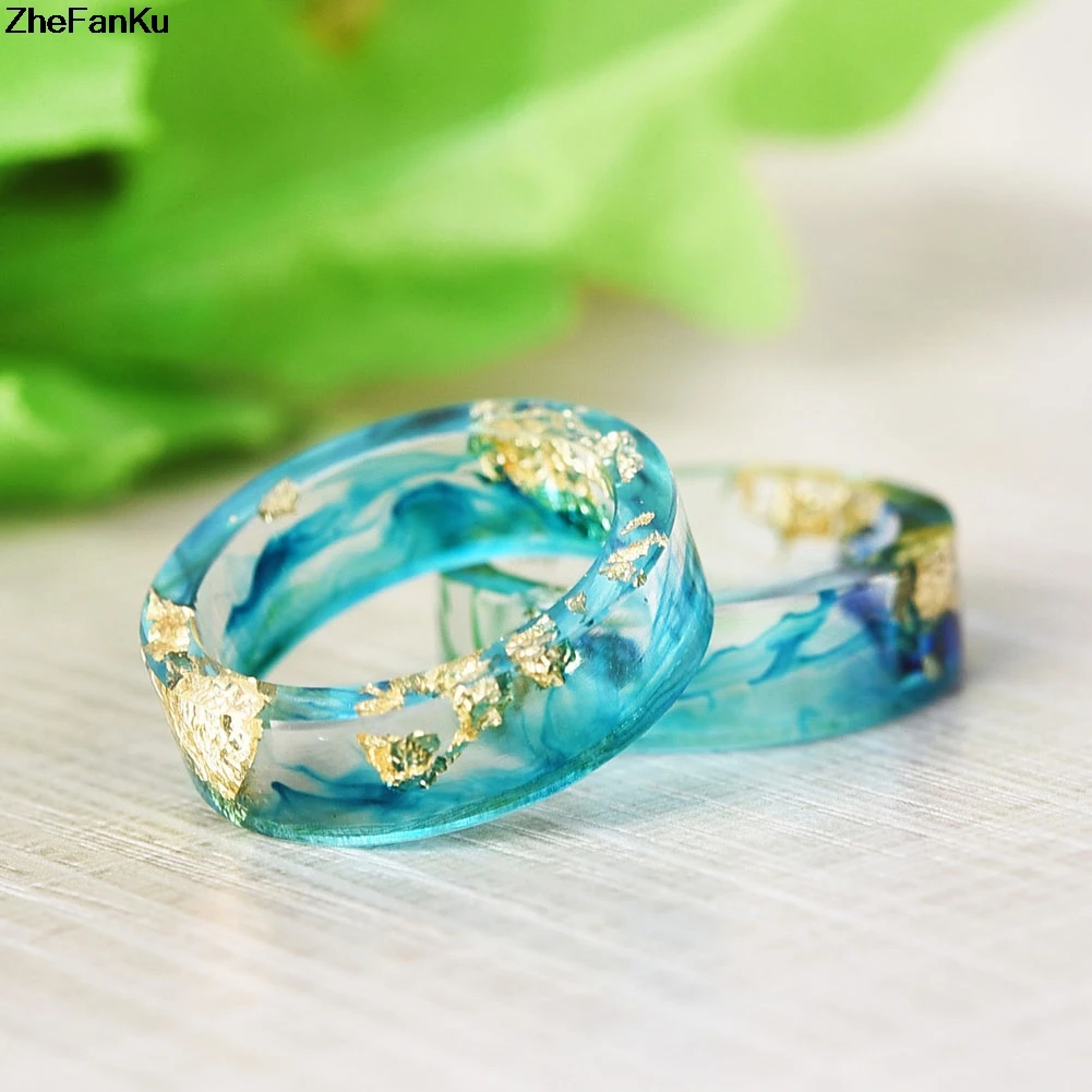 эпоксидная смола золото. эпоксидная смола кольца. кулон из смолы с поталью. камни в эпоксидной смоле. украшения из эпоксидной смолы.