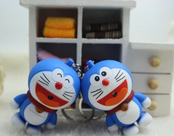 

Wholesale 100 pcs/lot New Cartoon Doraemon Toys Doraemon Figure LED Keychains Lighting Sounds Kids Toys Creative Gifts