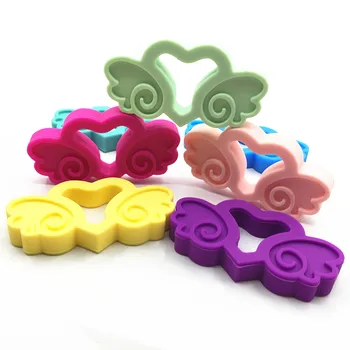

New Silicone teething Angel Wing pendant /Baby Teether / Hand held Teether for babies/Teething Pendant/ Silicone Necklace for Pe