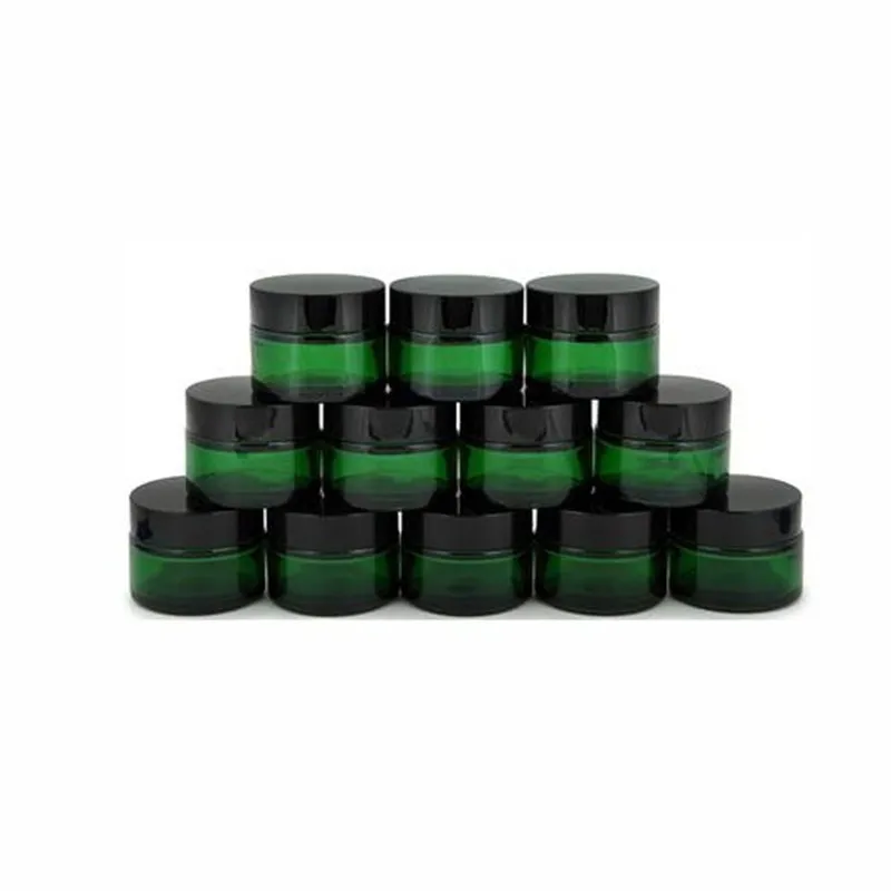 

12 1oz 30ml Green Glass Cream Jars Cosmetic Packaging with lid black plastic caps inner liners round empty small glass jar pot