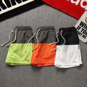 

Male Ladies Four Seasons students three-point Korean version five sports split loose casual male lad