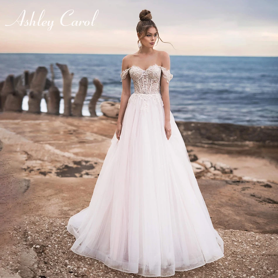 

Ashley Carol Elegant Sweetheart Strapless Crystal Beaded Tulle Wedding Dress 2019 Sexy Backless Lace Up Cap Sleeve Wedding Gowns
