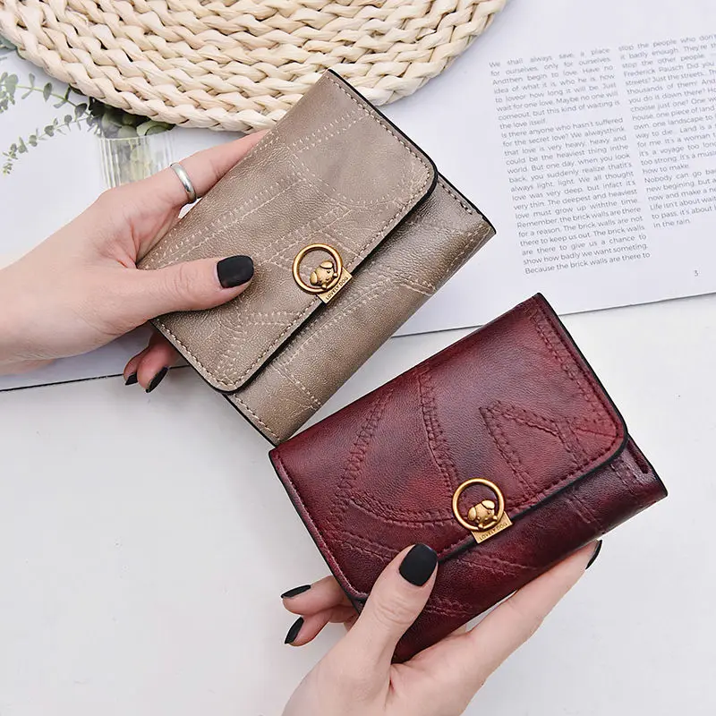 

2019 new Korean version of the wallet female short paragraph small wallet retro three folding card pack coin purse