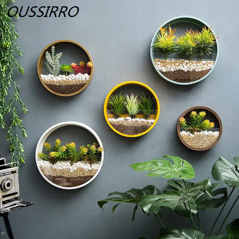 Macetas de vidrio de hierro para colgar en la pared creativas con