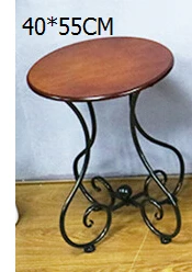 Ou, wrought iron wood coffee table. The balcony leisure small round table. The sofa corner. Small tea table. Ou, wrought iron wood coffee table. The balcony leisure small round table. The sofa corner. Small tea table.