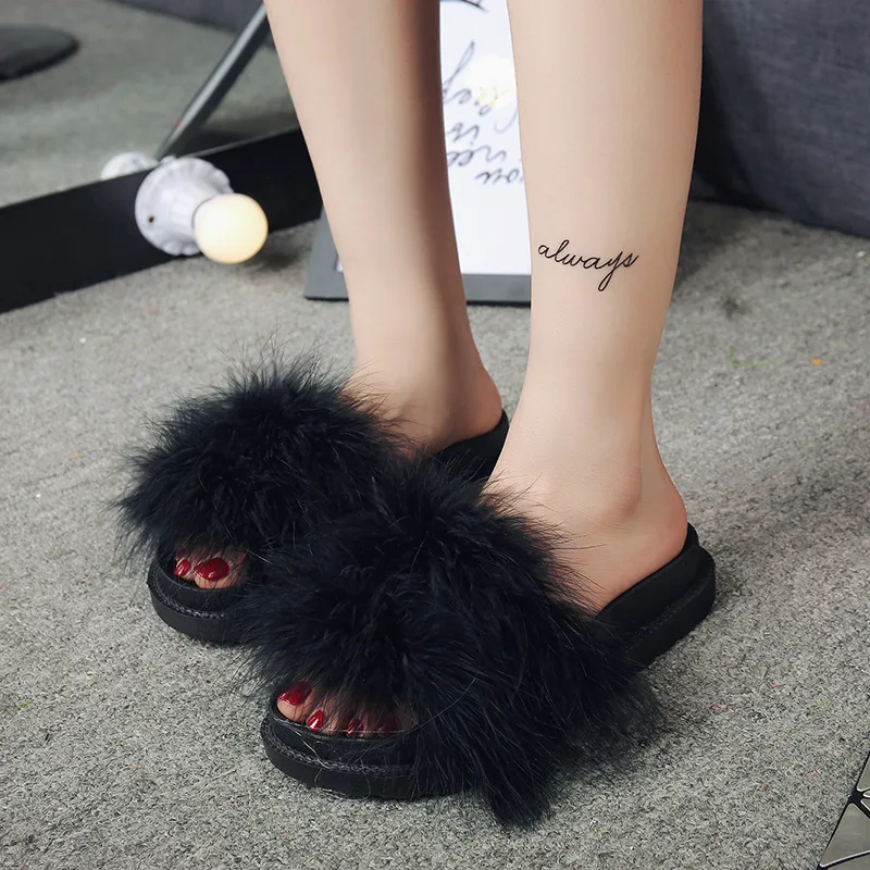 

Summer new handmade feather slippers thick word mop with sponge sand beach slippers.