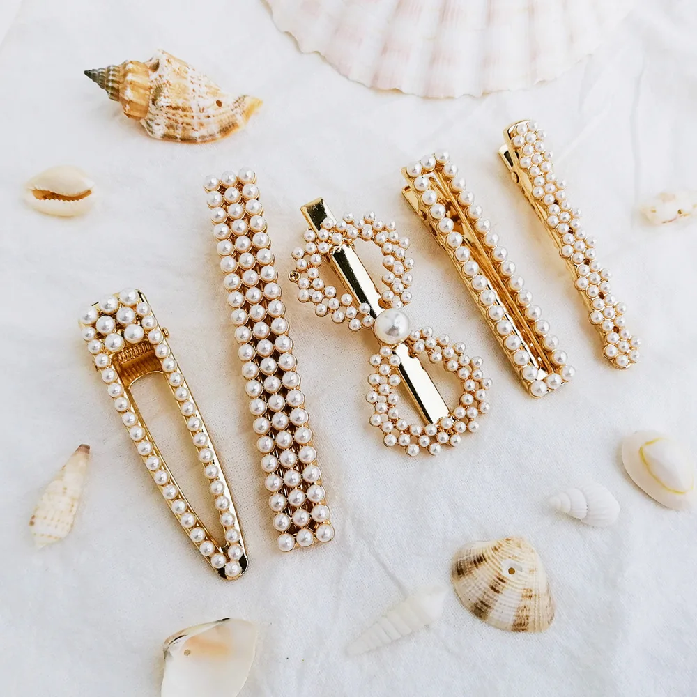 

New flower-shaped pearl ladies hairpin creative retro ins pearl hairpin simple duckbill clip girls hairpin