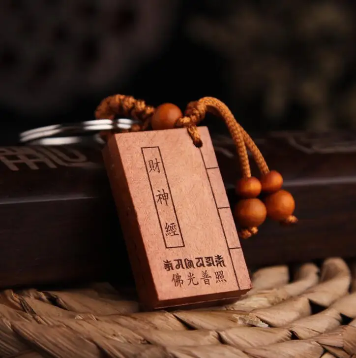 

Chinese Peach Wood Carved Book Shape Pendant Buddhism Wealth Confucian Classics Exquisite Car Key Chain Pendant