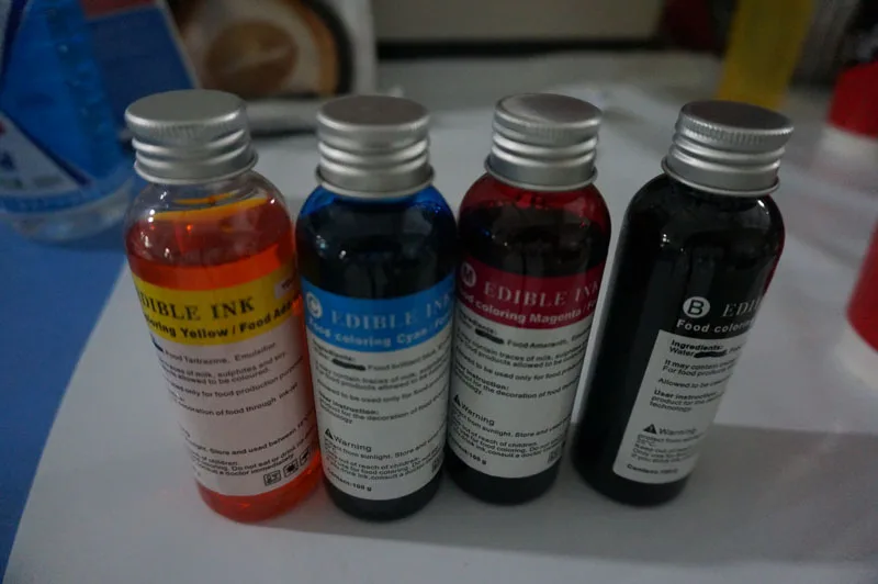 

2set /Lot , 4*100ml per set Edible ink for coffee Flatbed Printer to print coffee , cake , candy etc