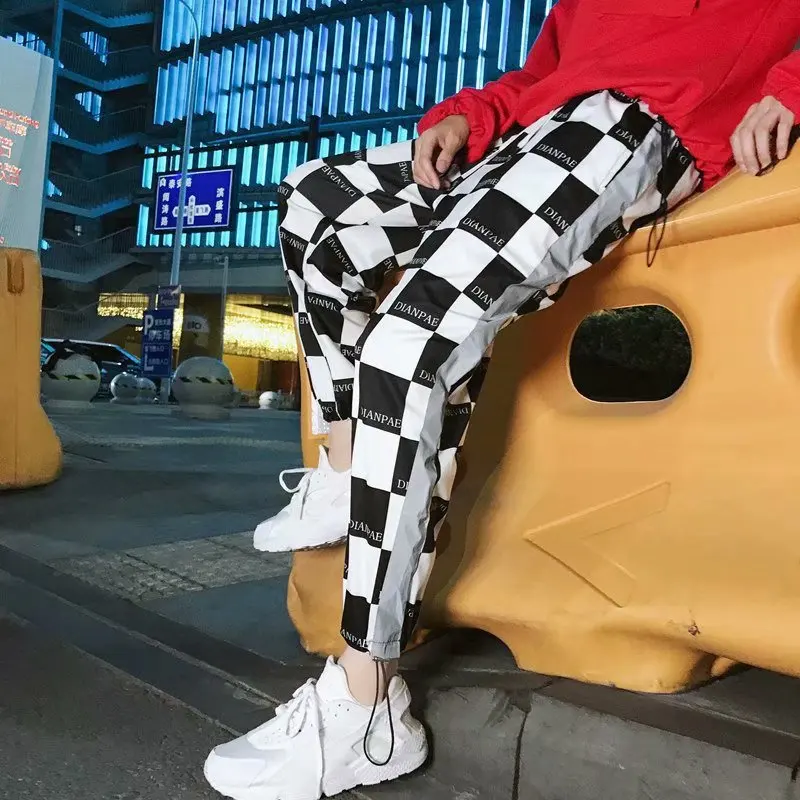 Корейская версия мужчин и женщин с новым стилем клетчатые талии повседневные брюки светоотражающие полосы свободные Harlan луч ноги девять брюки