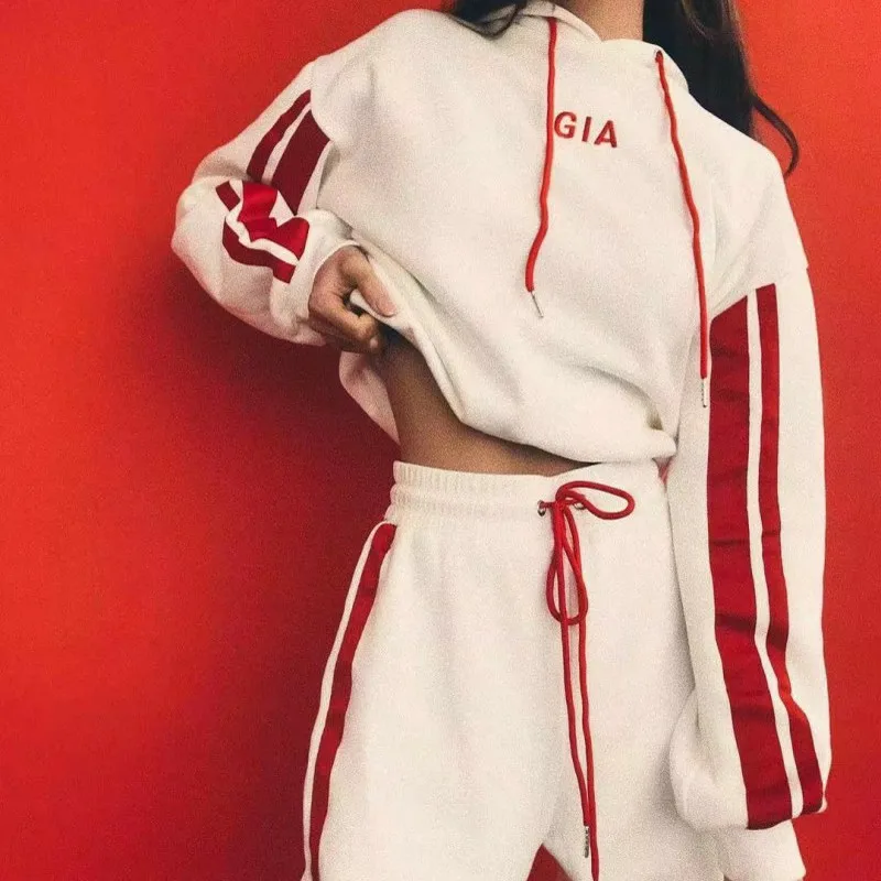 

2019 new European and American color matching striped lace hooded sweater sports and leisure suit women's hooded suit