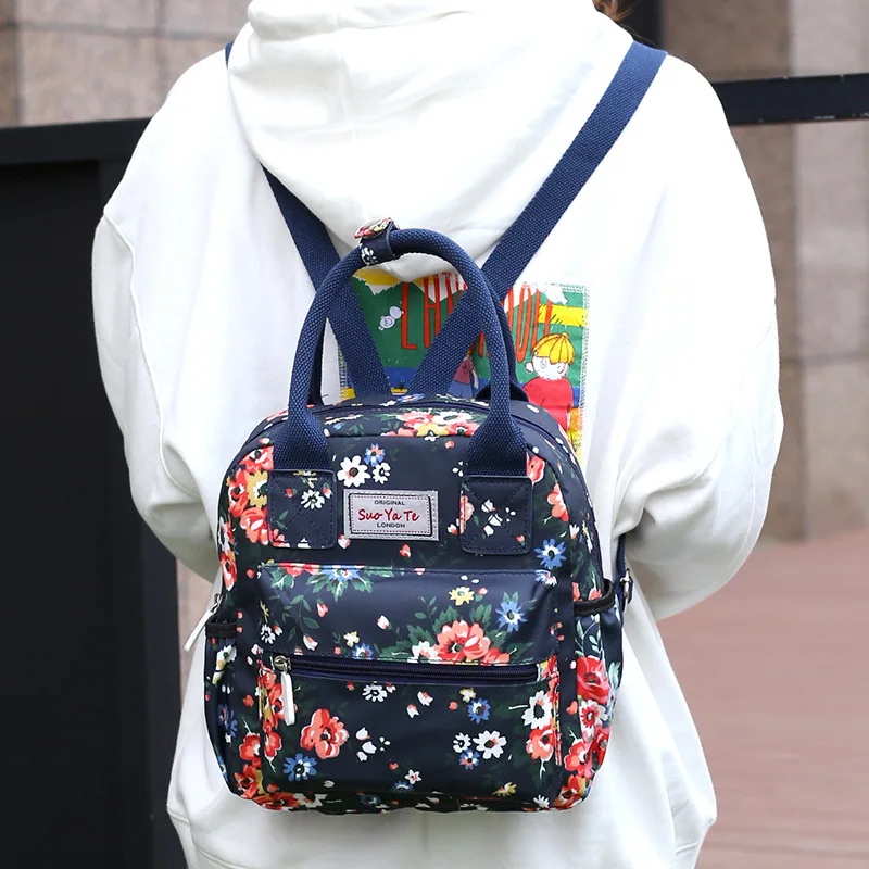 

Multi-functional nylon women's bag new variety of small and fresh hand hand with multiple shoulder bag women's backpack