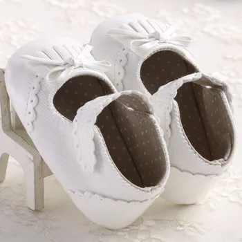 

New born female baby baby solid color tassel soft bottom PU leather fashion princess shoes baby first walker toddler