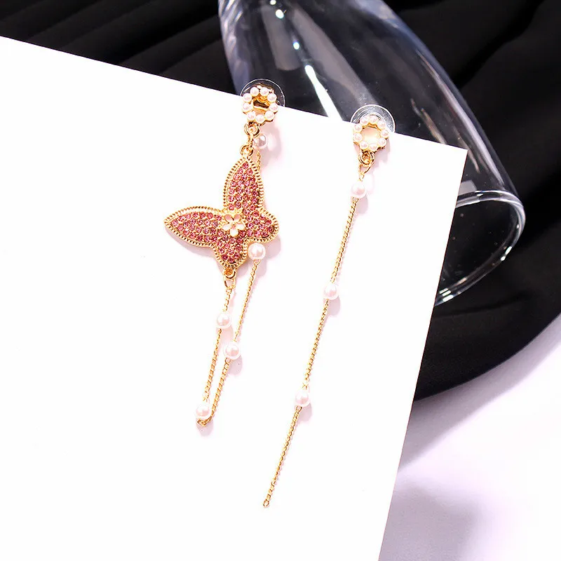 

Trendy Crystal Bowknot Women Dangle Earrings Asymmetric Long Fringed Pearl Butterfly Earrings Drop Earrings Jewelry Earrings