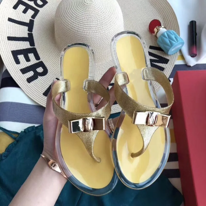 

Women Brand Jelly Shoes Female Stud Bowknot Flat Slippers PVC Summer Beach Flip Flops for Girls Casual Slides Outdoor Slippers