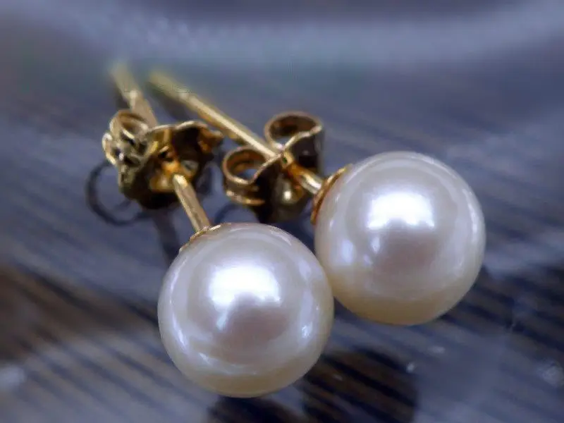 

Free Shipping >>>> new round AAA + 8-7mm South Seas white pearl earrings with 14 k