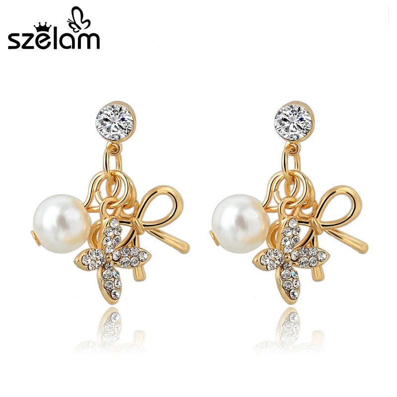 

MELIHE Crystal Bowknot Statement Earrings Gold Simulated Pearl Stud Earrings For Women Vintage Bridal Wedding Jewelry SER150050